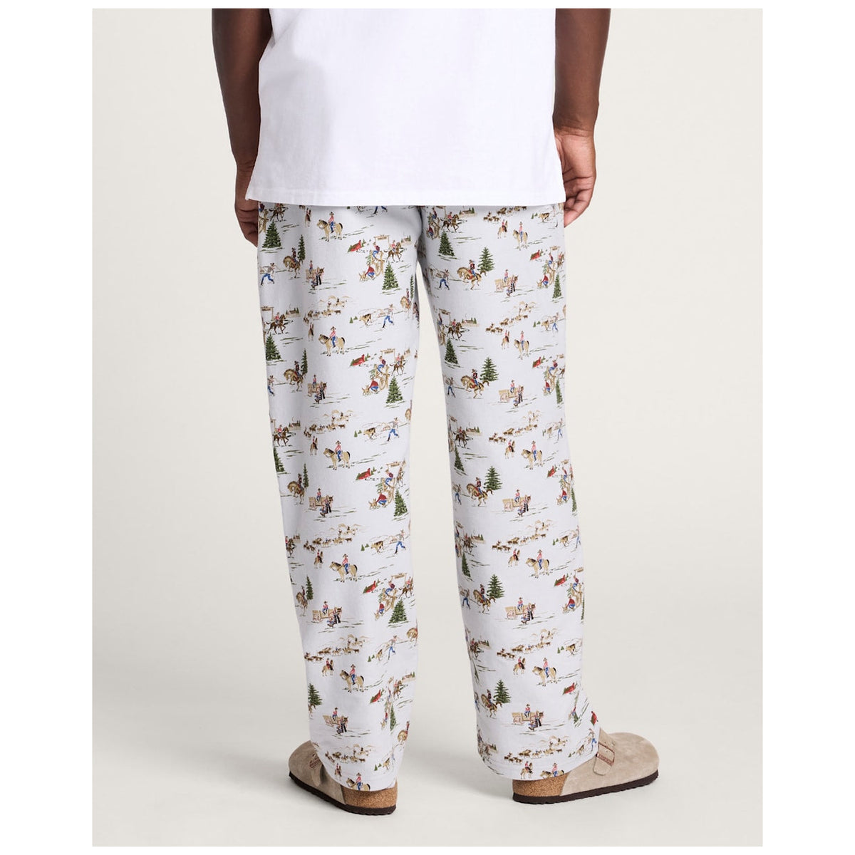 Pendleton pajama pants in Cowboy Blue with western winter scene print, back view on model