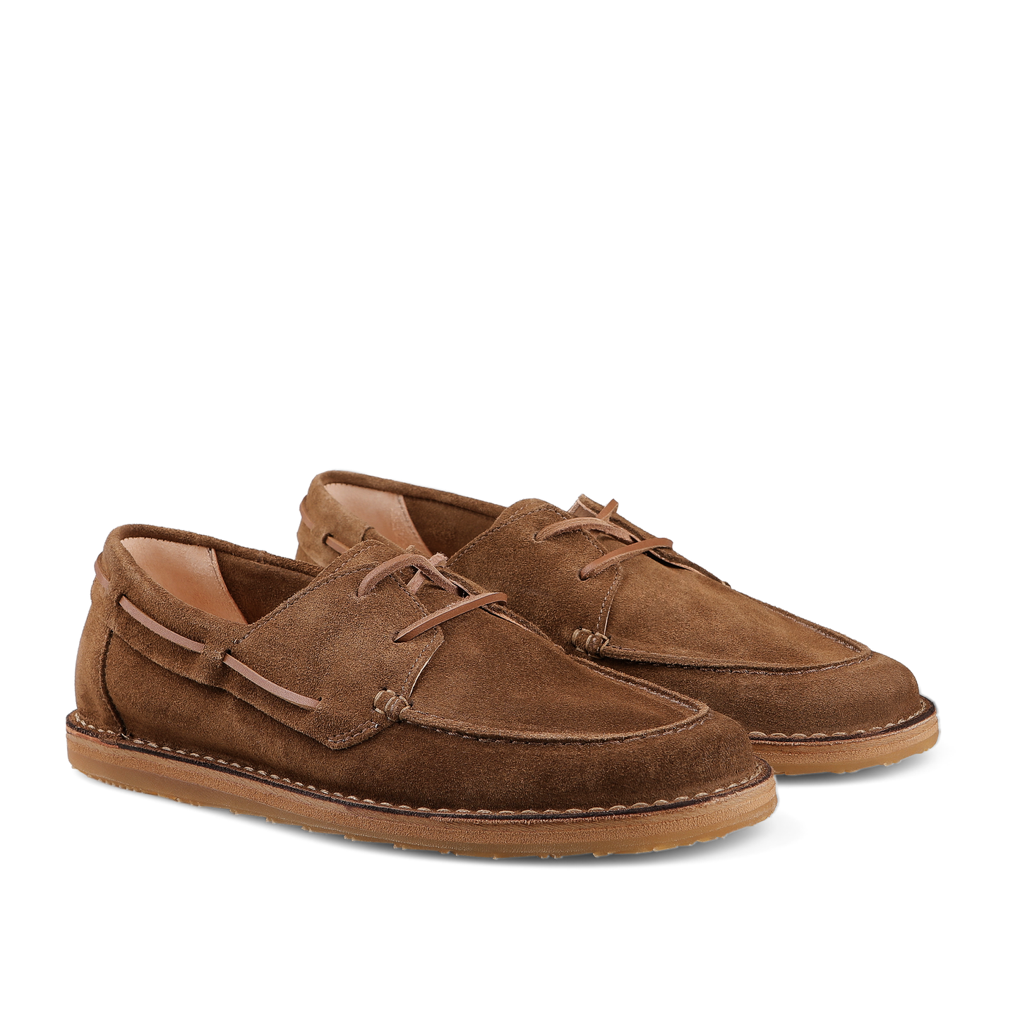 Brown suede boat shoes with leather laces on white background
