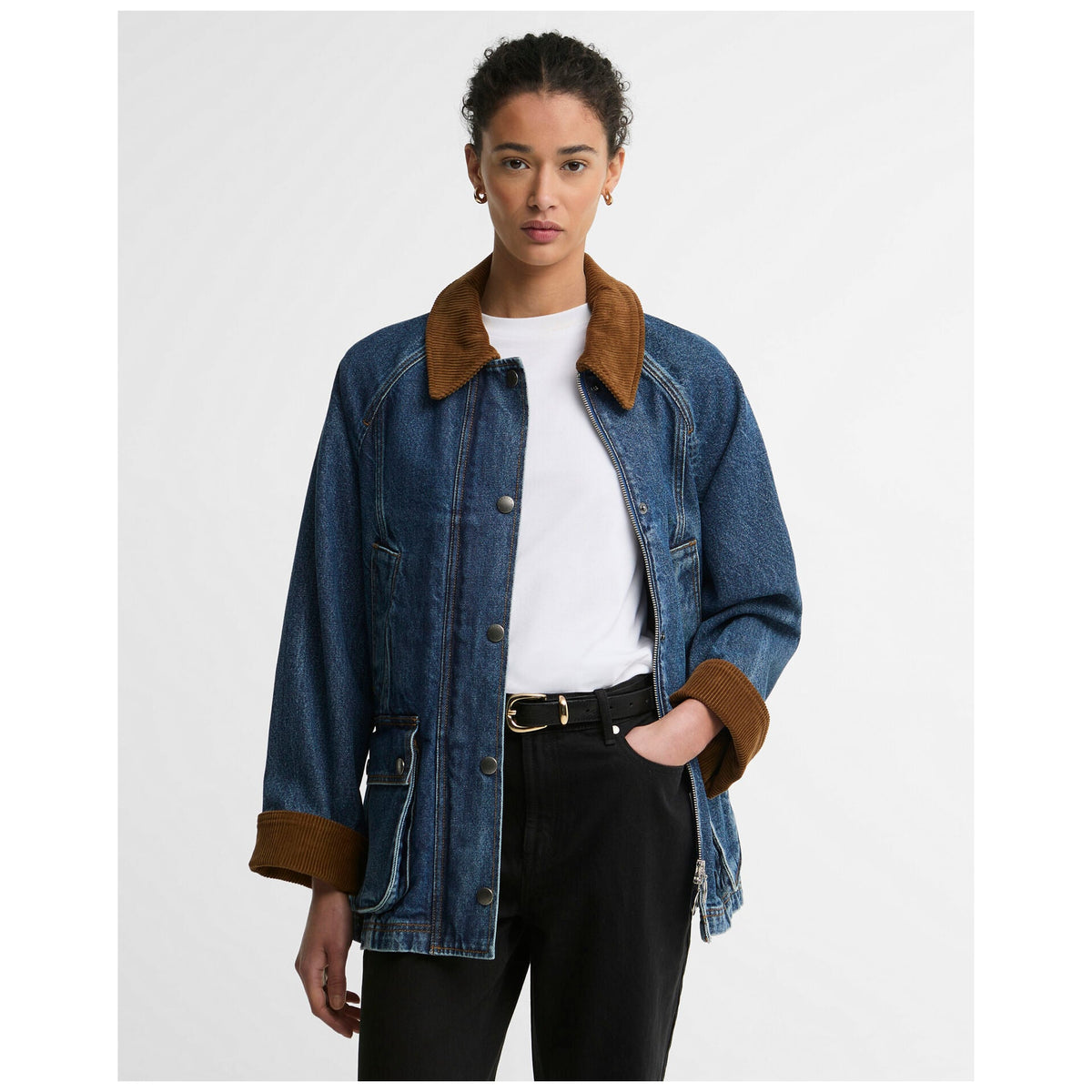 Woman wearing Barbour Modern Beadnell denim jacket with corduroy collar in mid blue