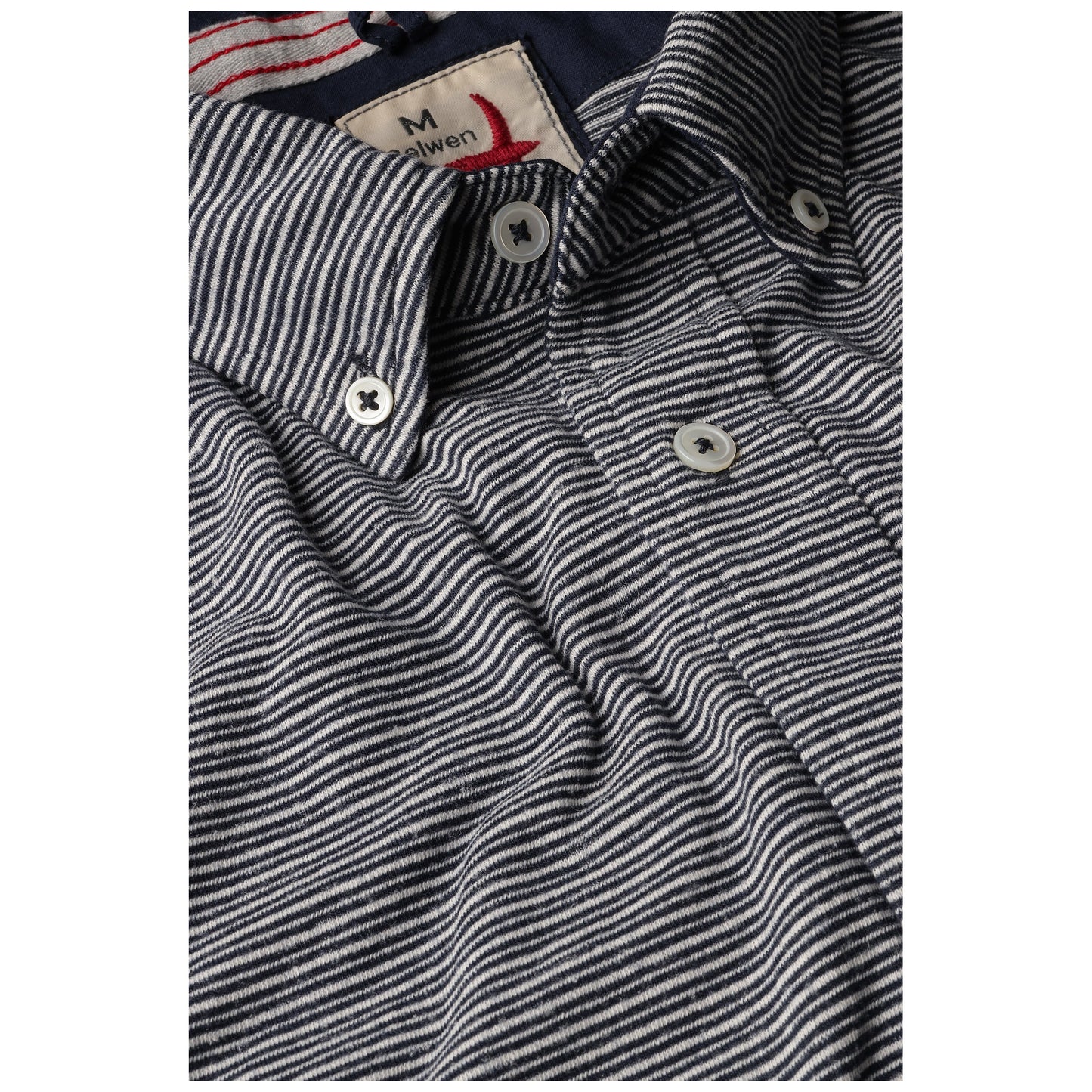 Close-up of Relwen Hemp Stripe Buttondown in navy and white fine stripes with white buttons