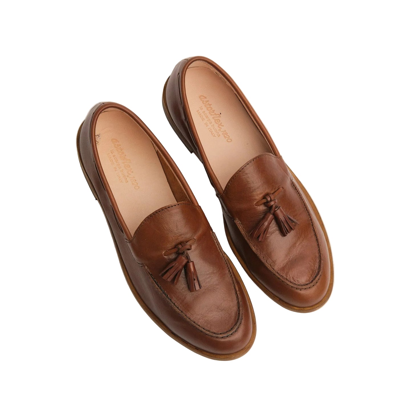 Brown leather tassel loafers with visible Astorflex branding on insole